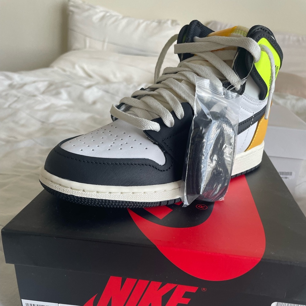 New Jordan 1’s

Equivalent to a womens 6/6.5
Boys size 4.5
white/black/volt gold